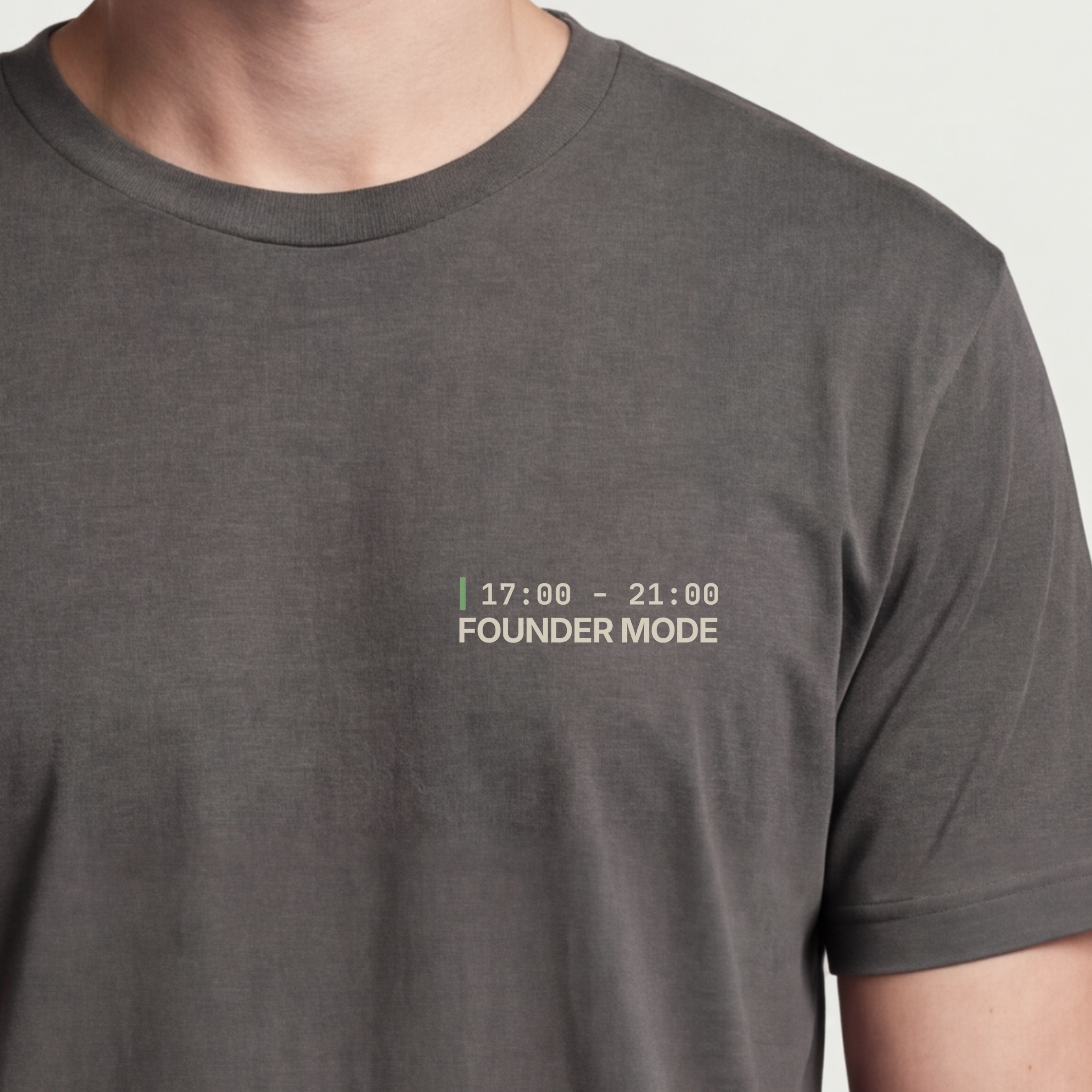 Founder Threads | 5 to 9 Founder Tee. Asphalt Grey startup builder gear. Minimalist gift for ambitious developers. Hero crop detail.