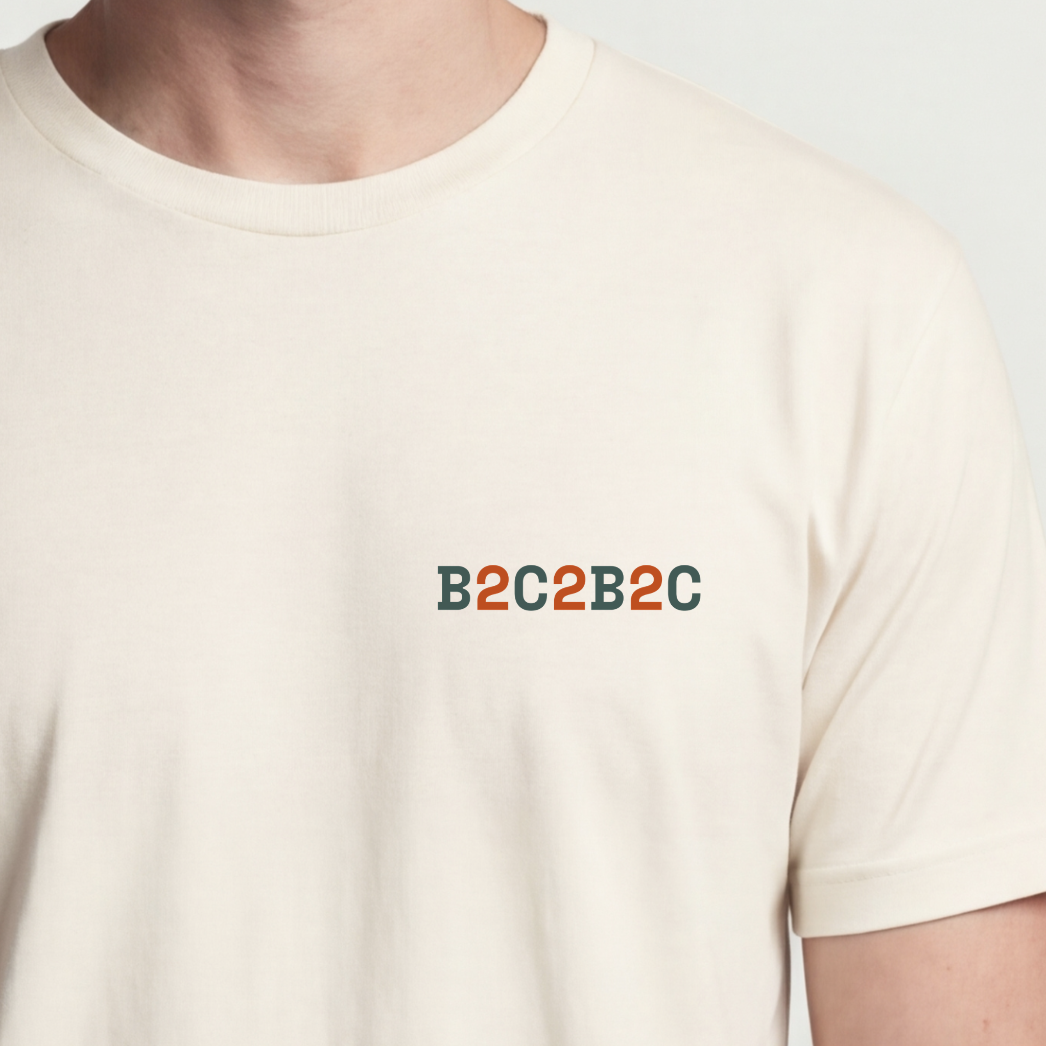 Founder Threads | B2C2B2C Tee - Clean Typography Closeup - Natural Bone - Hero Crop. Clean palette identity for technical founders.