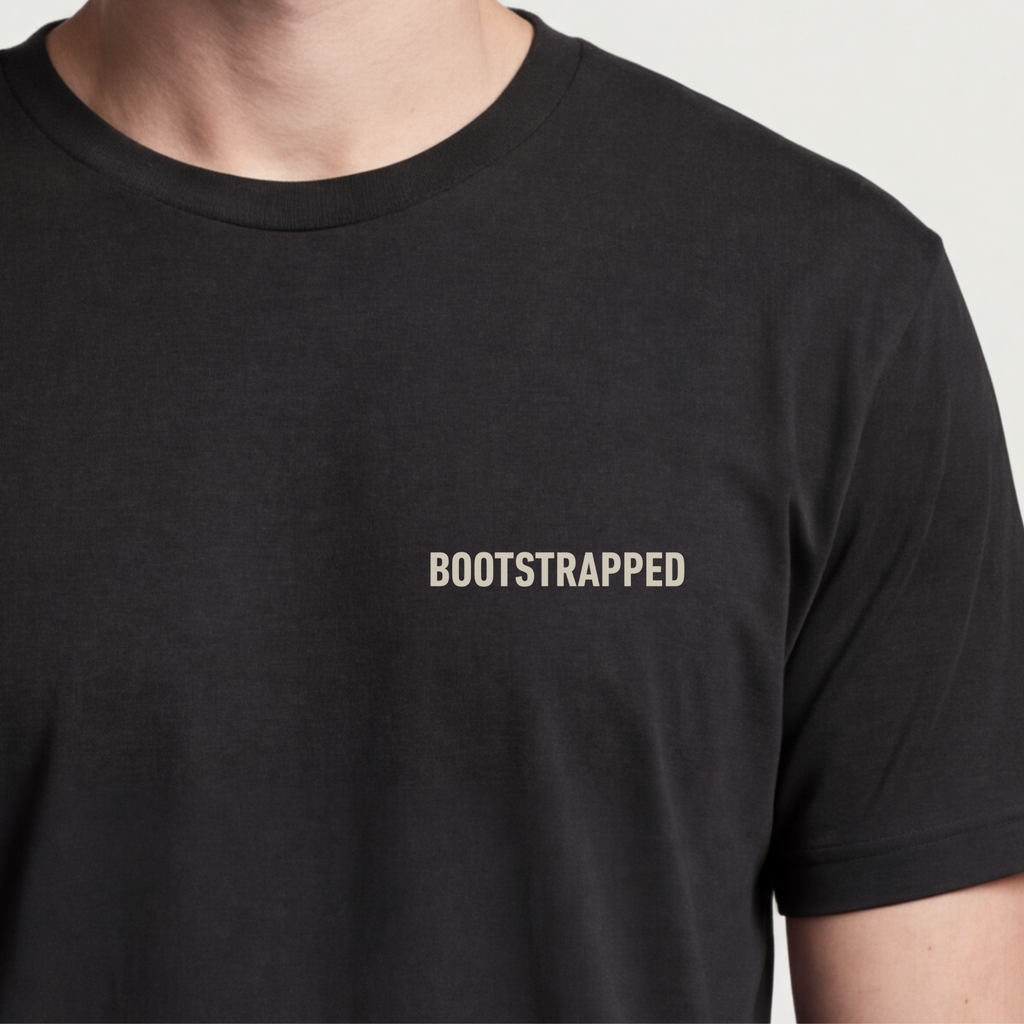 Founder Threads | Bootstrapped Tee - Customer Funded Identity - System Black - Hero Crop. Gift for independent founders and solo-founders.