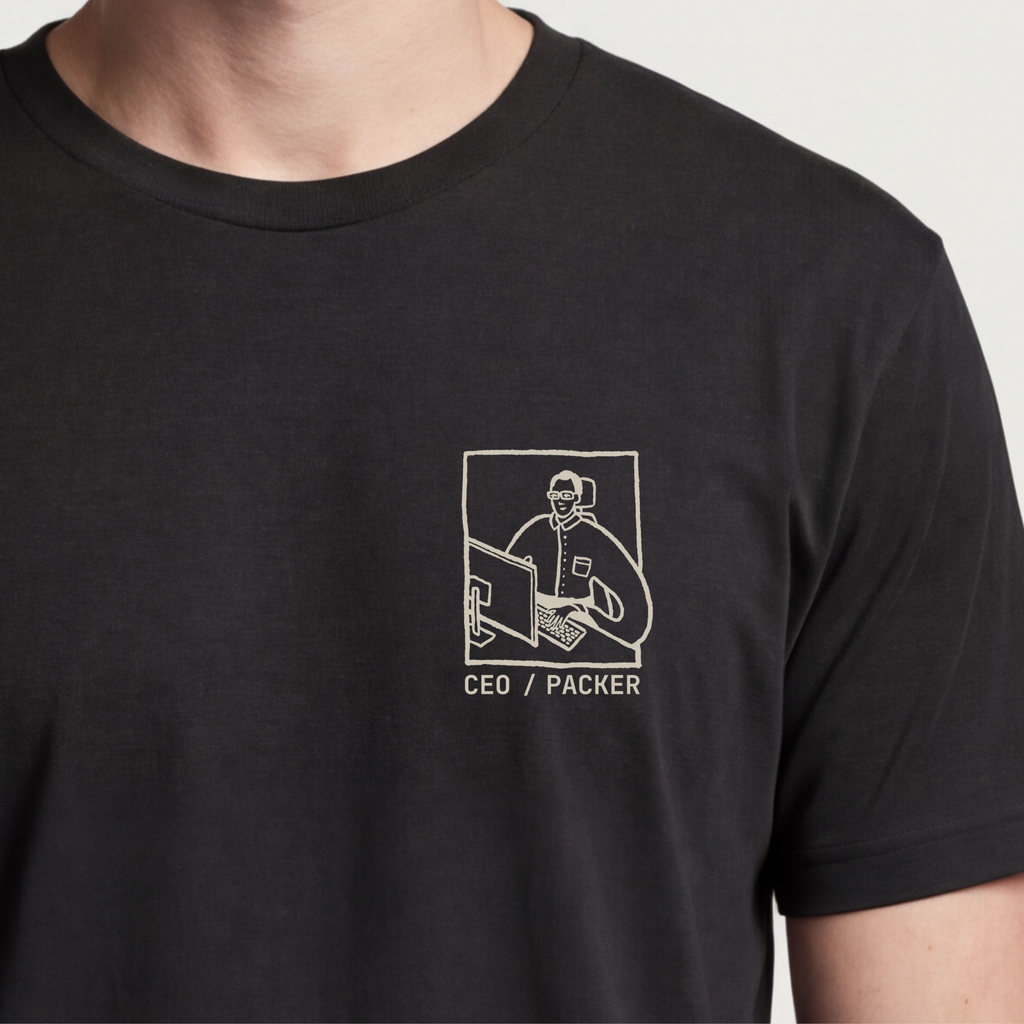 Founder Threads | CEO / Packer Tee - Solopreneur Duality - System Black - Hero Crop. Gift for Shopify entrepreneurs who handle fulfillment.