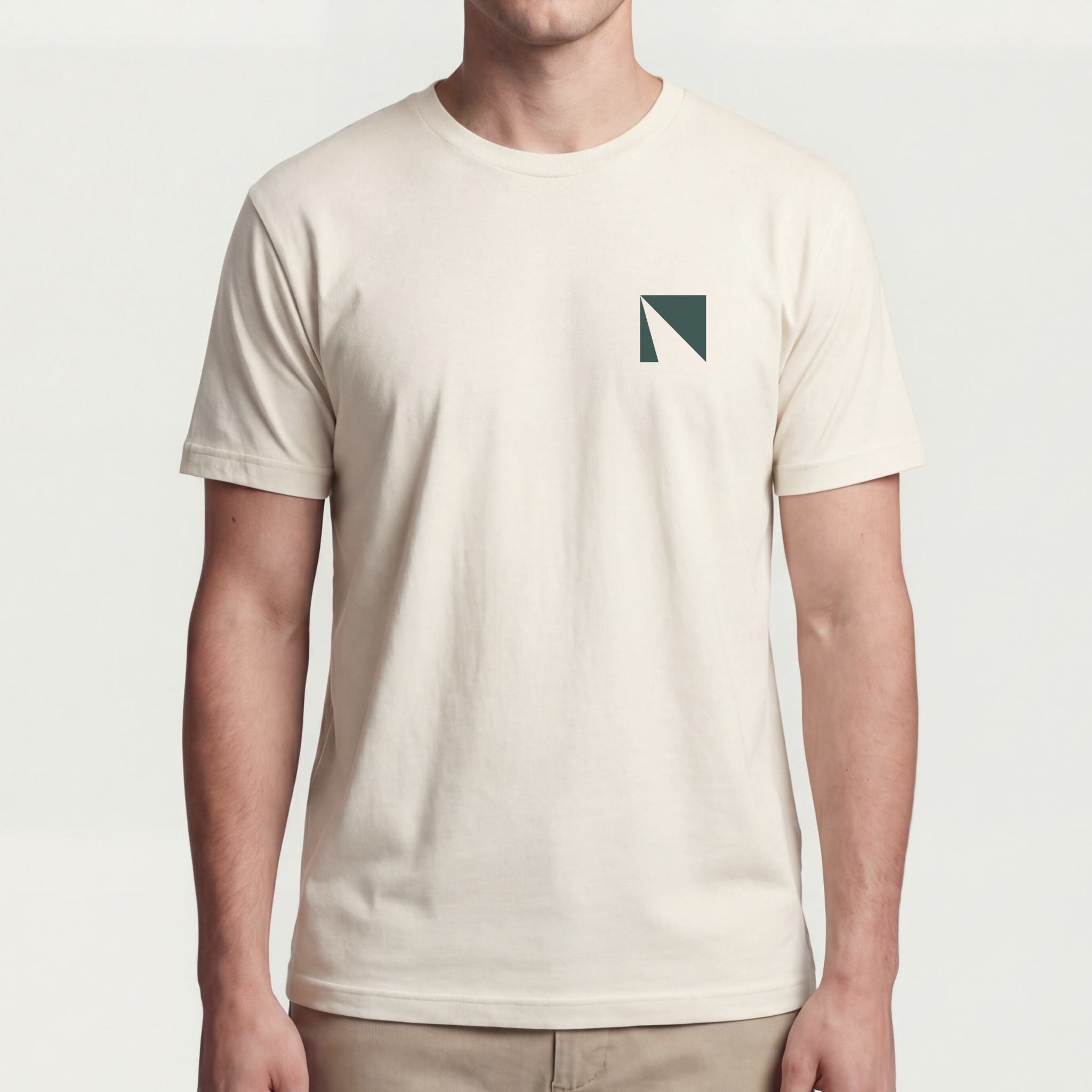 Founder Threads | Delta Tee. Natural Bone minimalist essential. Professional uniform for tech builders. Full fit view.