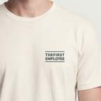 Founder Threads | The First Employee Tee - Light Palette Detail - Natural Bone - Hero Crop. Light-tone identity tee for the solo founder wardrobe.