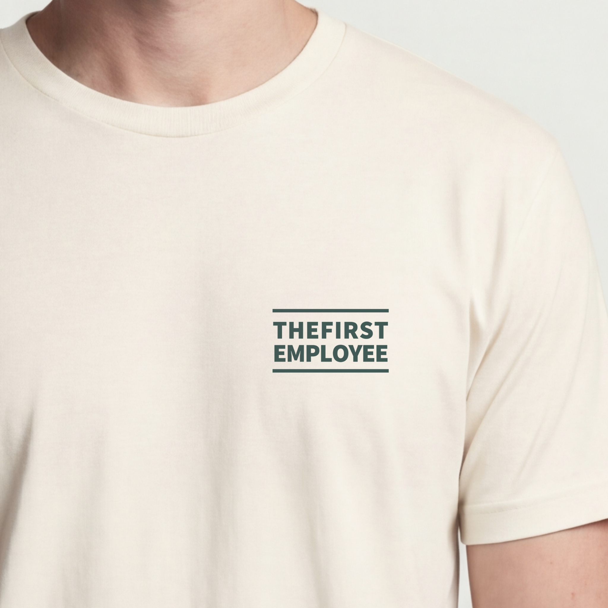 Founder Threads | The First Employee Tee - Light Palette Detail - Natural Bone - Hero Crop. Light-tone identity tee for the solo founder wardrobe.