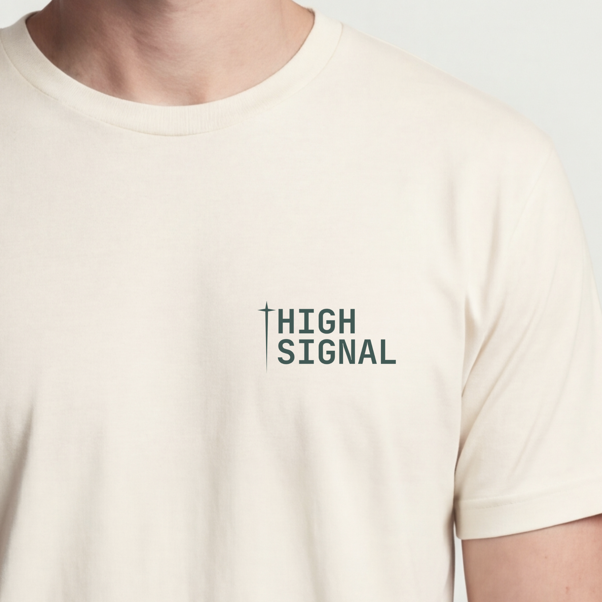 Founder Threads | High Signal Technical Tee. Natural Bone minimalist design for software engineers. Hero crop view.