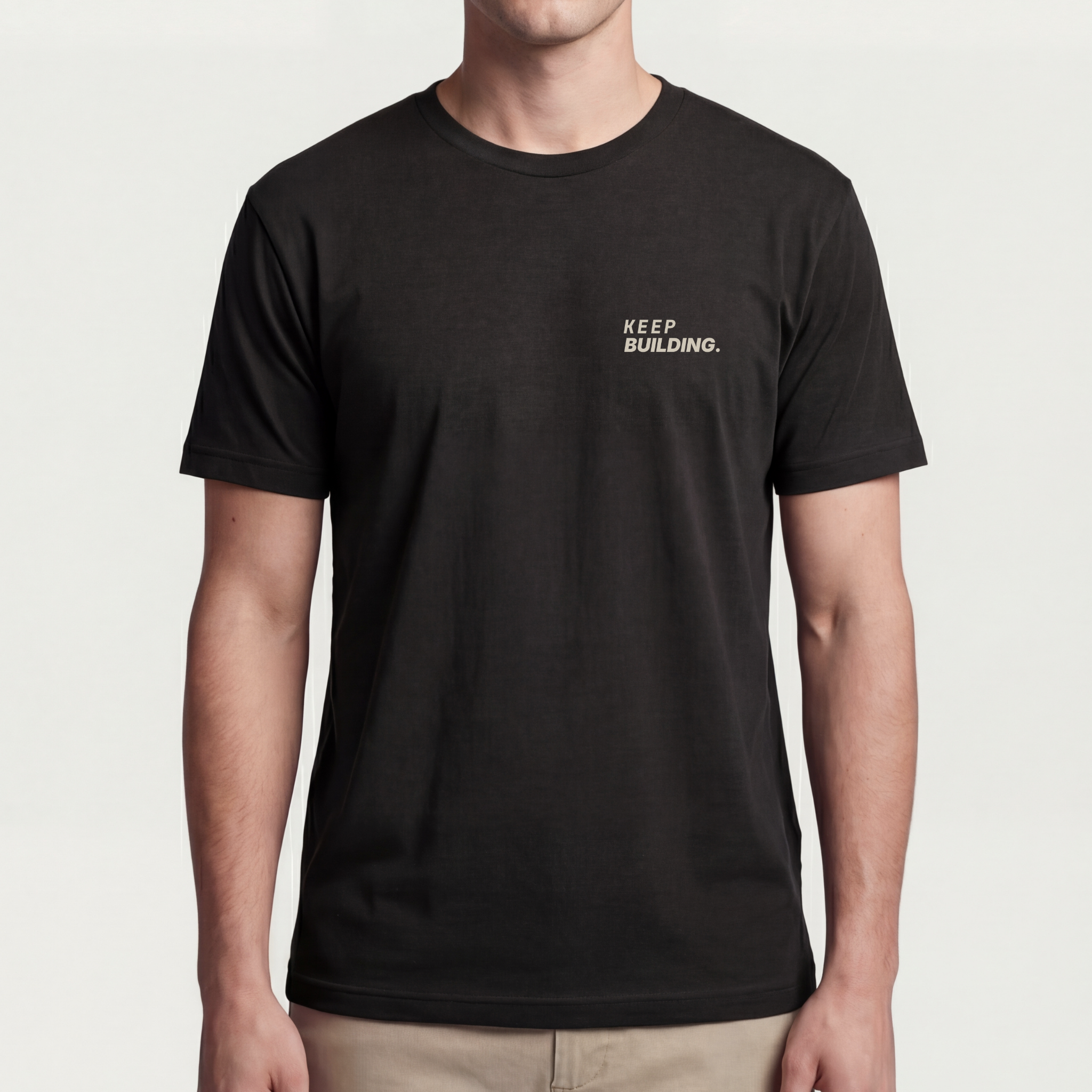 Founder Threads | Keep Building Tee. System Black CEO gear. Premium fit for technical founders during market crashes. Full fit view.