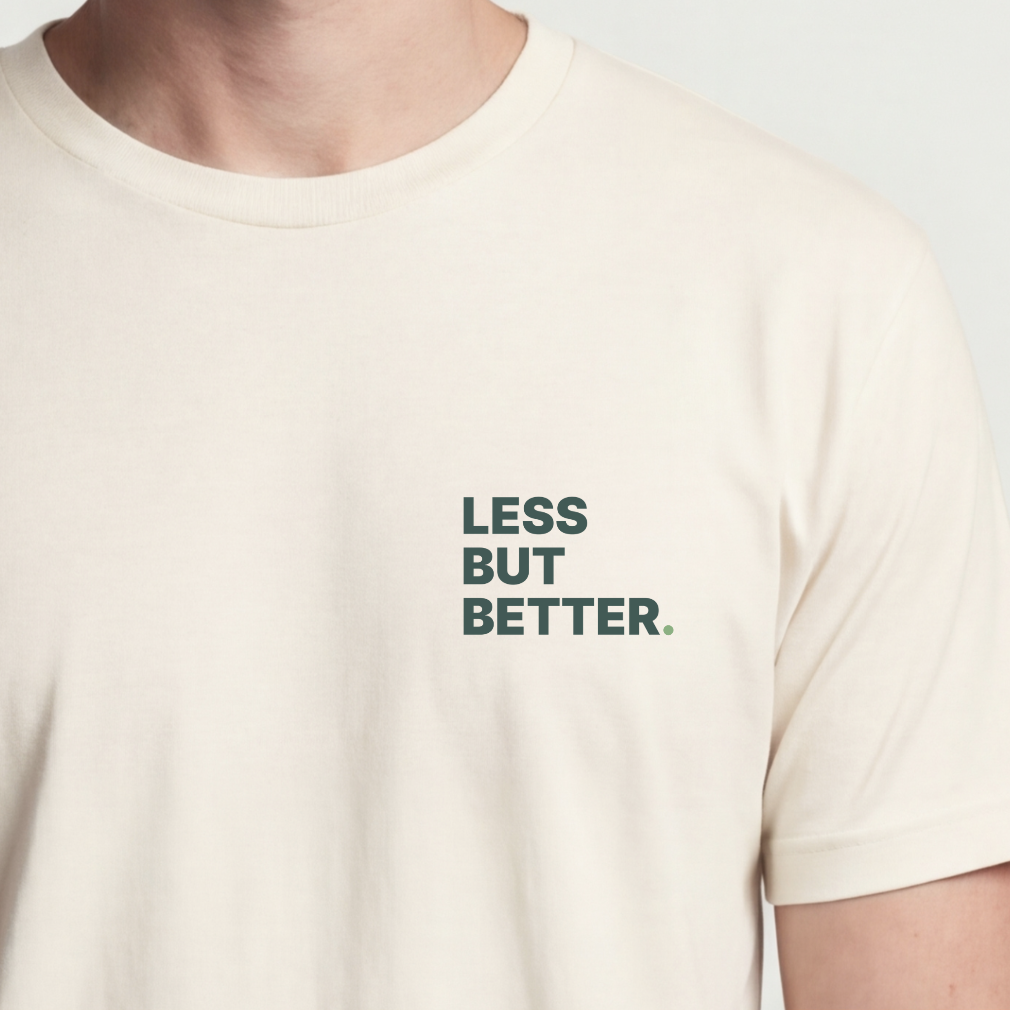 Founder Threads | Less But Better Tee - Technical Design - Natural Bone - Hero Crop. Minimalist typography for engineering founders.