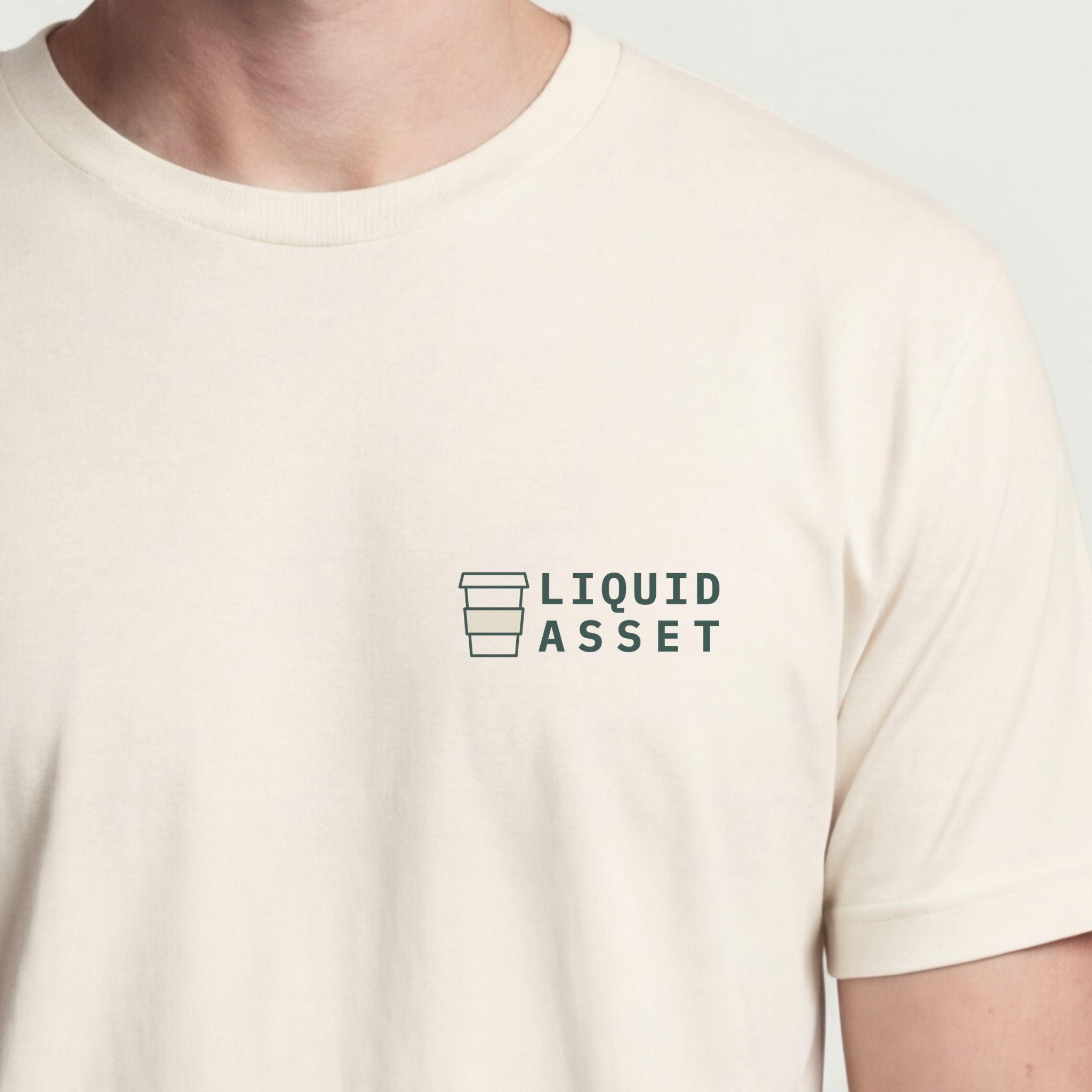 Founder Threads | Liquid Asset Technical Tee - Natural Bone - Hero Crop. Minimalist typography for software engineers and Shopify founders.