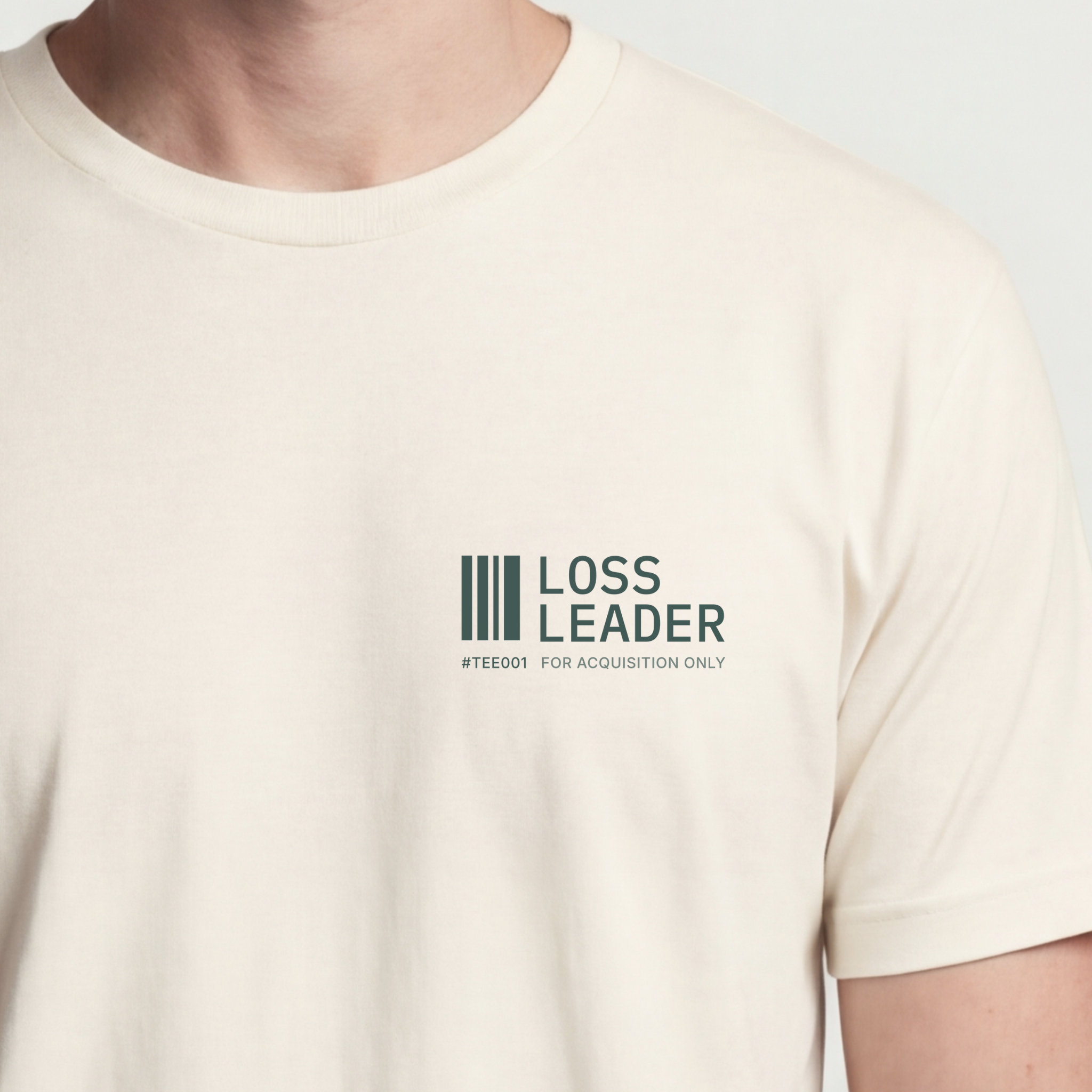 Founder Threads | Loss Leader Tee - Technical Standards - Natural Bone - Hero Crop. Minimalist barcode logic for backend developers.