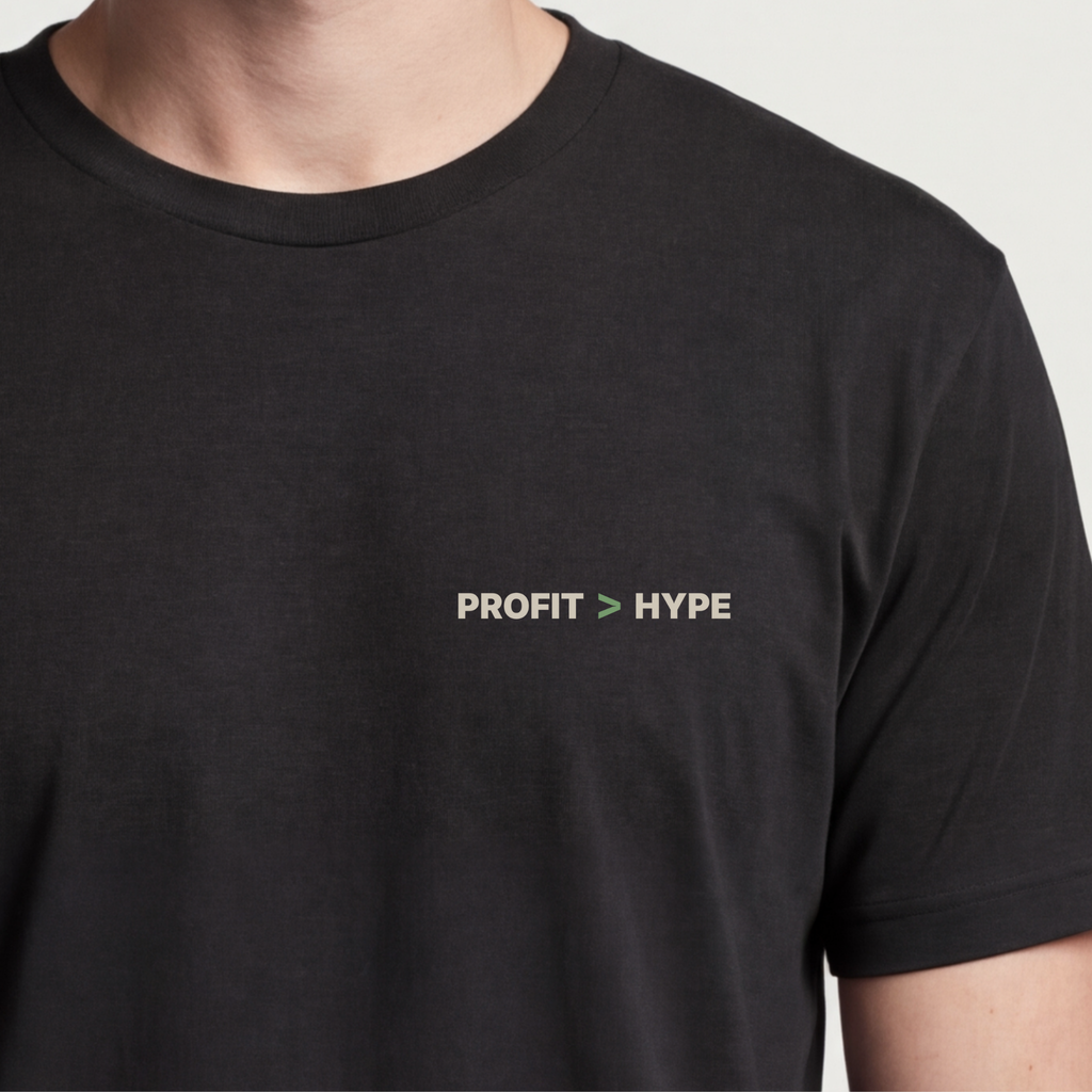 Founder Threads | Profit > Hype Tee. System Black unit economics gear for sustainable tech builders. Hero crop view.