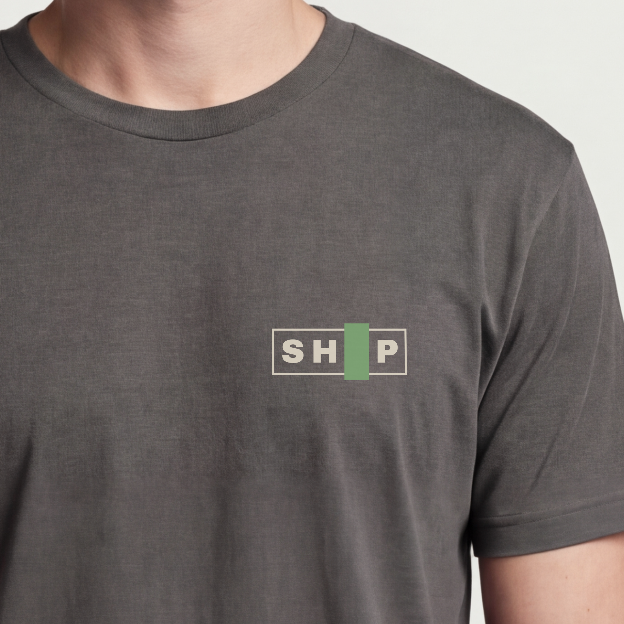 Founder Threads | SHIP Tee. Asphalt Grey startup builder uniform. The ultimate 'ship it' manifesto. Hero crop detail.
