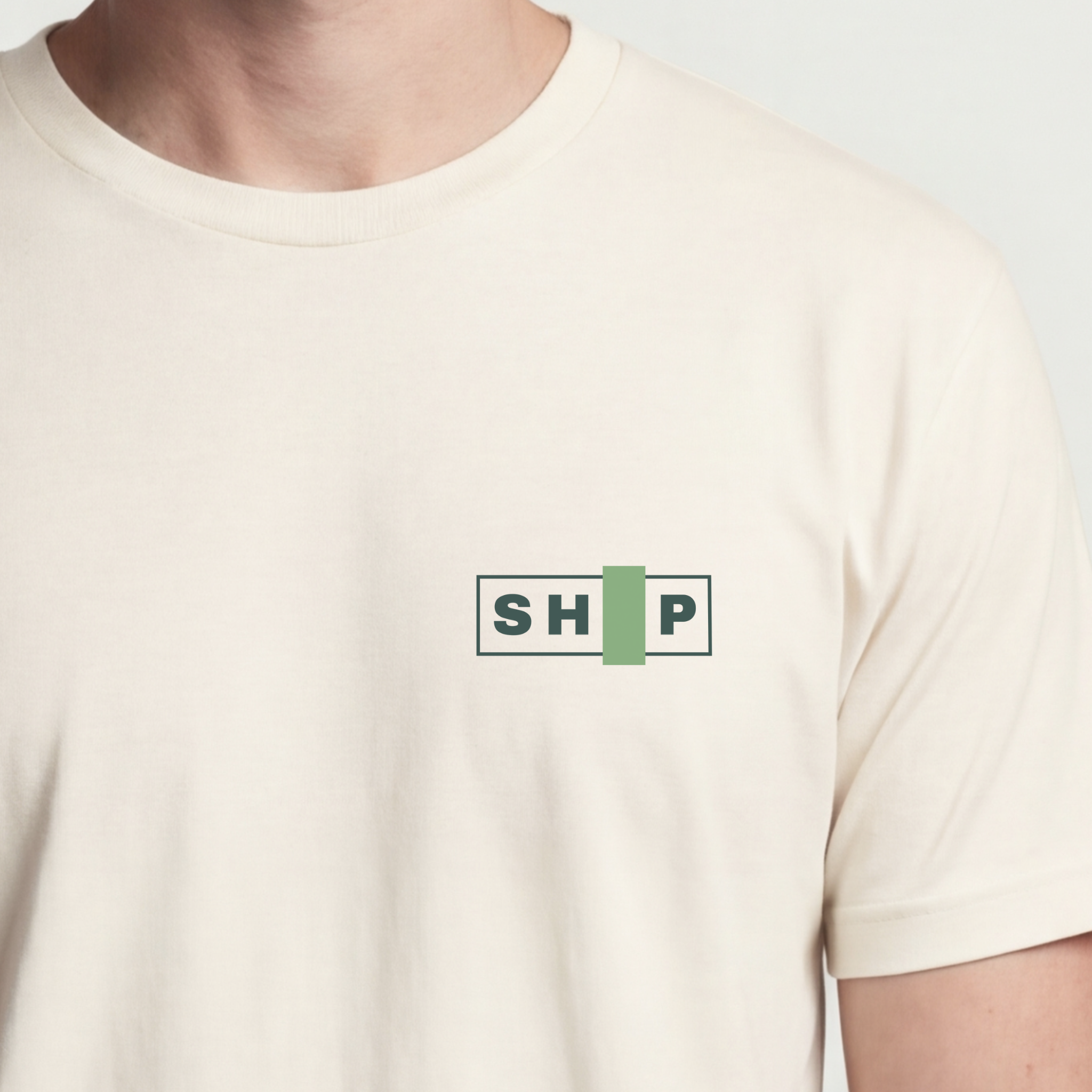 Founder Threads | SHIP Technical Tee. Natural Bone minimalist design for developers. No localhost, just ship. Hero crop view.