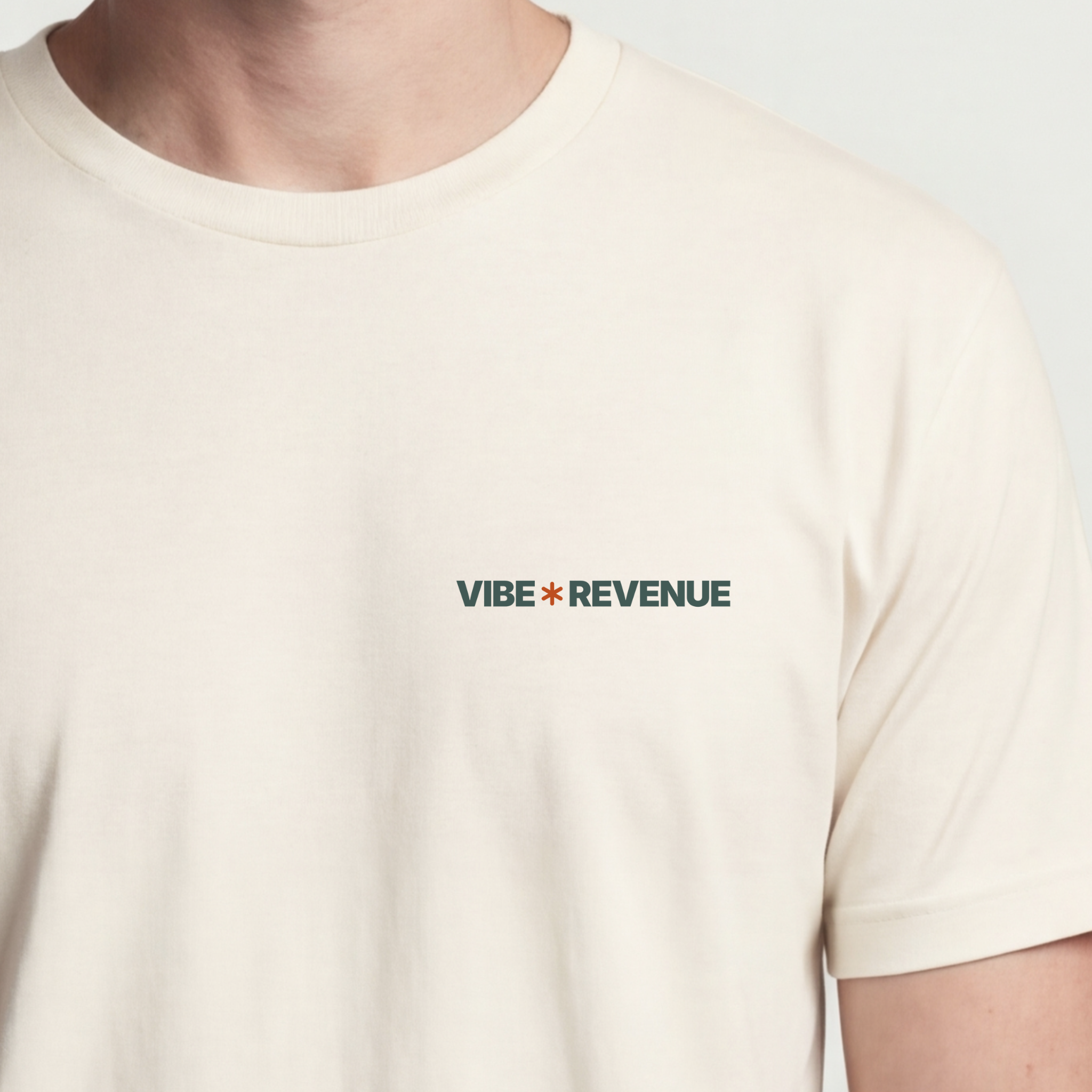 Founder Threads | Vibe Revenue Technical Tee. Natural Bone minimalist design for software engineers. Hero crop view.
